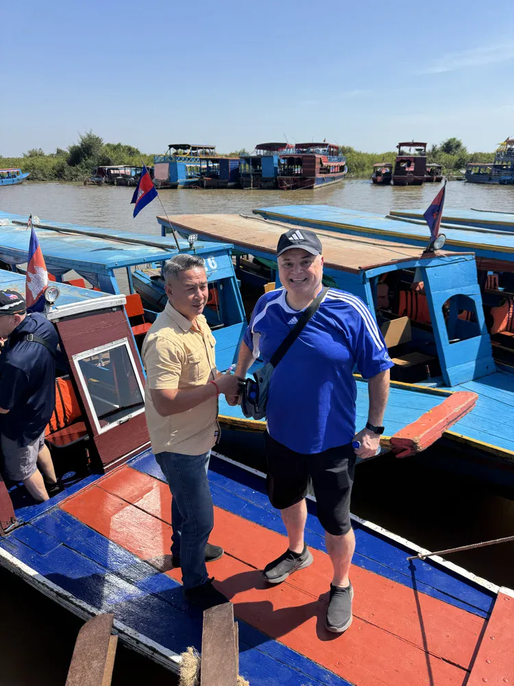 Men by the river in Siem Reap